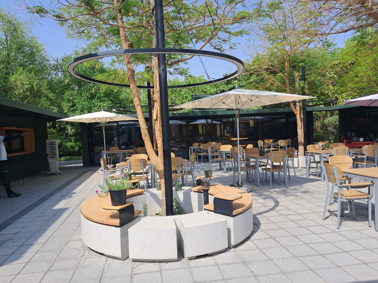 Close-up of Fortino umbrella frame and granite base installed in Dubai