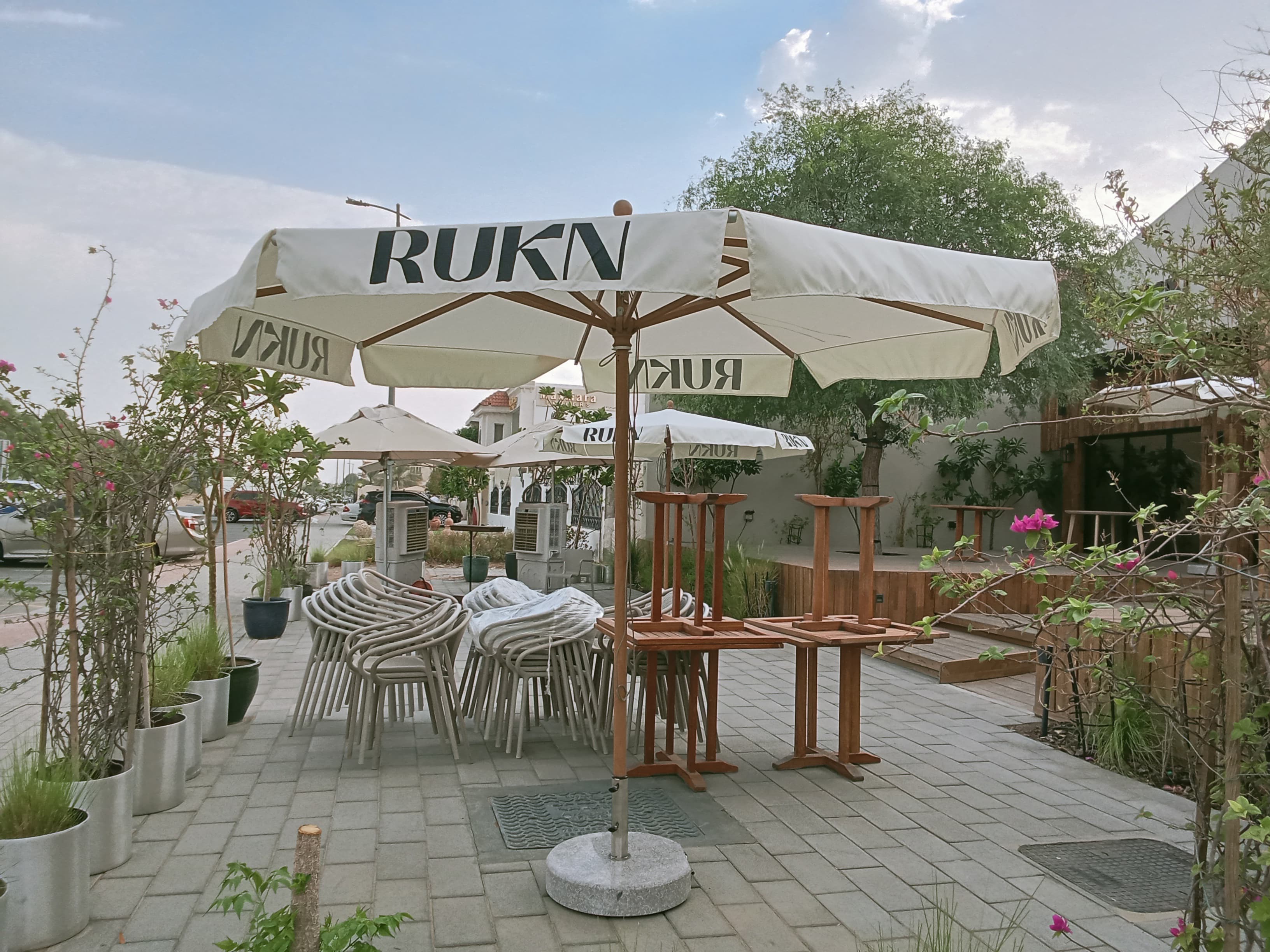 Close-up of ecru canopy flap detail on Piazza umbrella in Al Ain