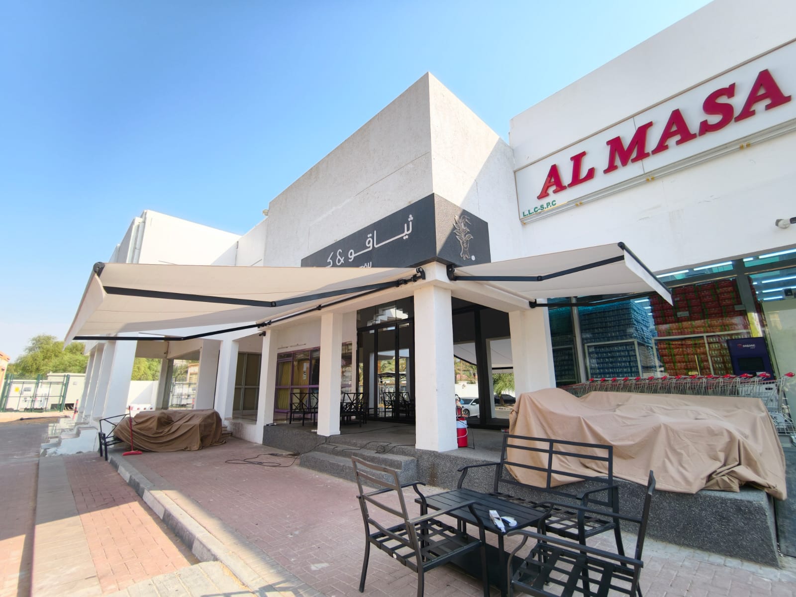 Close-up of motorised awning frame and fabric finish in Al Ain